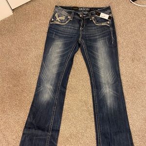 Jeans. Size 28. Mid Rise. Grace in LA